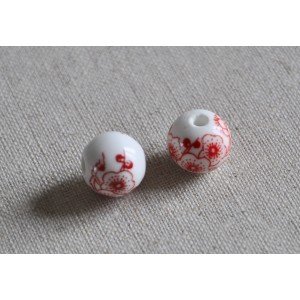 Perles blanches fleurs rouges en céramique diam 12mm    (lot de 2)