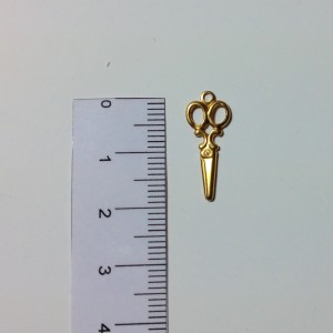 Broche épingle 5 trous en métal 7x2cm